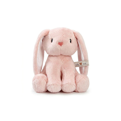 Pink plush bunny toy with a heart on a white background