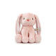 Pink plush bunny toy with a heart on a white background