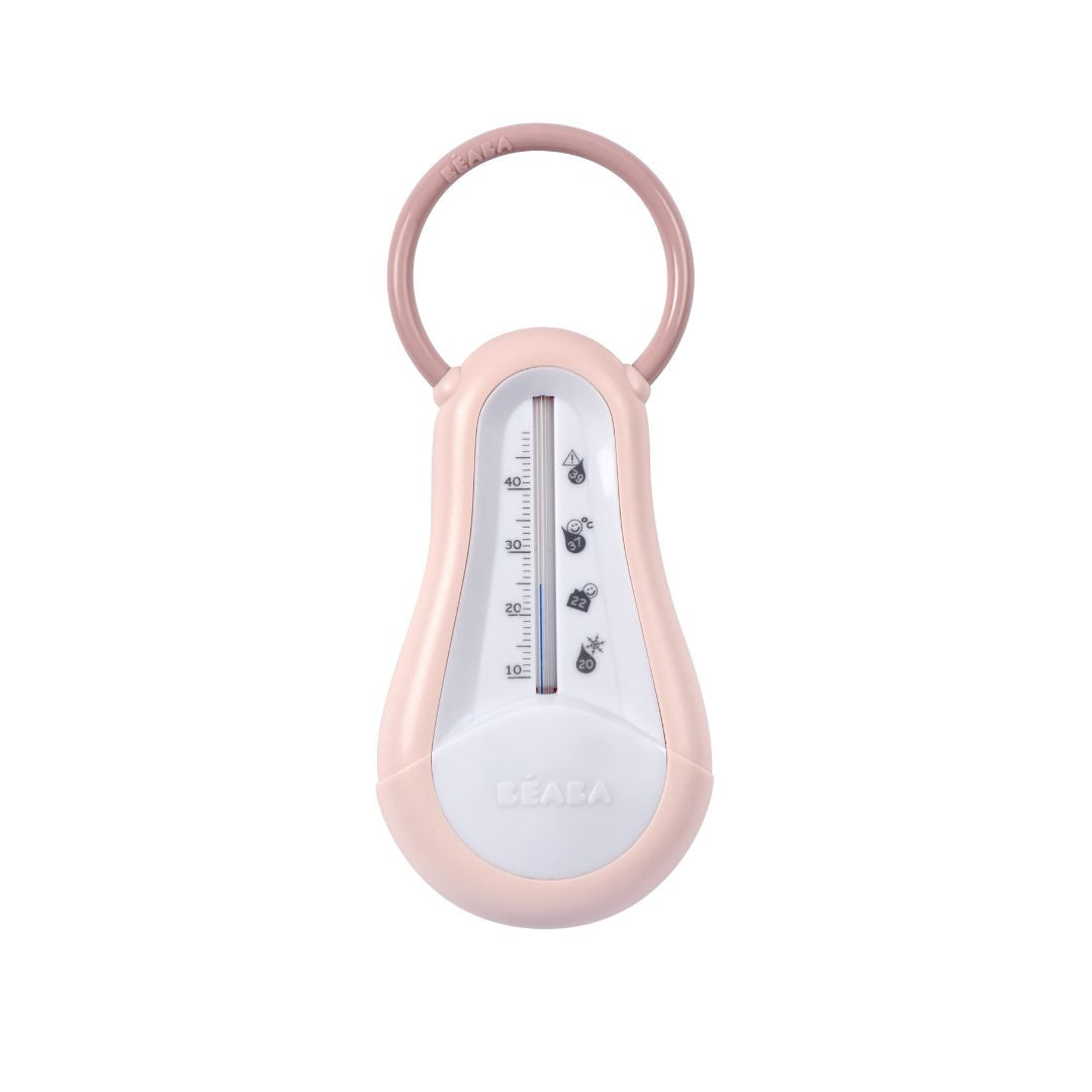 Pink thermometer with a keychain on a white background