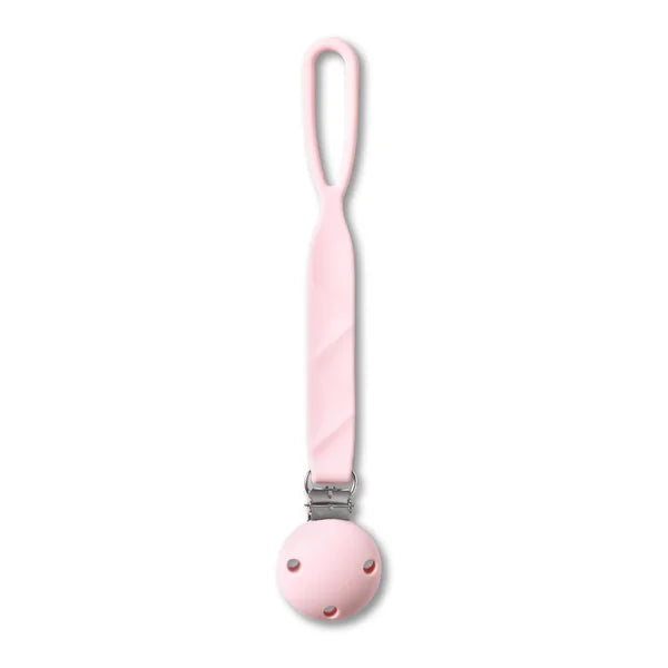 Soft pink Babyono silicone pacifier holder with a secure clothing clip and flexible strap.