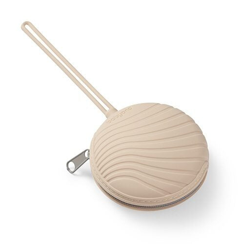 Neutral beige silicone soother case with a zipper and flexible loop for attachment to bags or strollers.