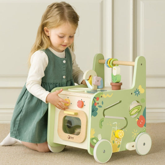 Classic World Wooden Kitchen Walker baby walker with play kitchen
Toddler playing with wooden kitchen walker and accessories
Wooden baby walker with sink stove and oven play set
Classic World kitchen walker safe edges detail
Child using Classic World Wooden Kitchen Walker indoors