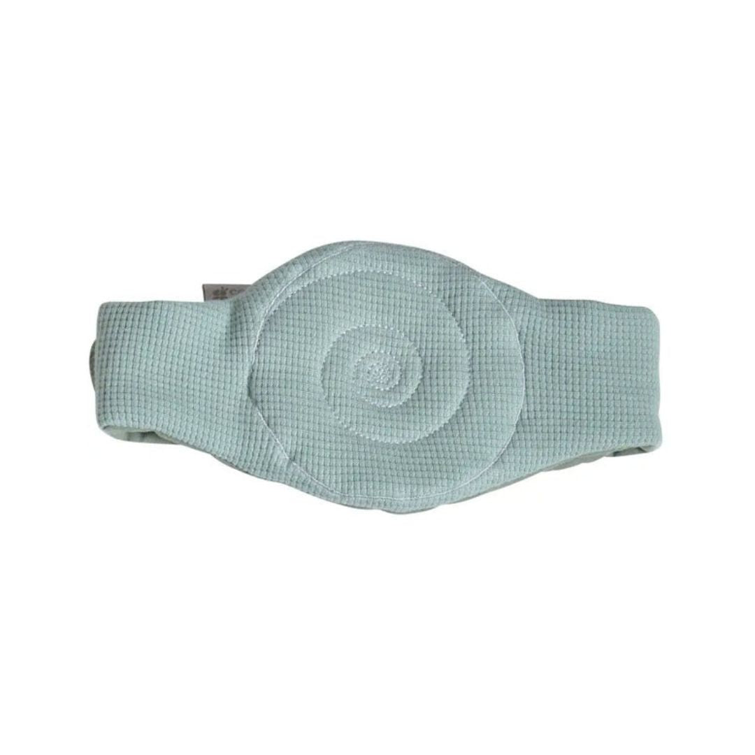 Sage green Candide mini massage heat pack for babies featuring a cherry stone pouch and adjustable Velcro straps.