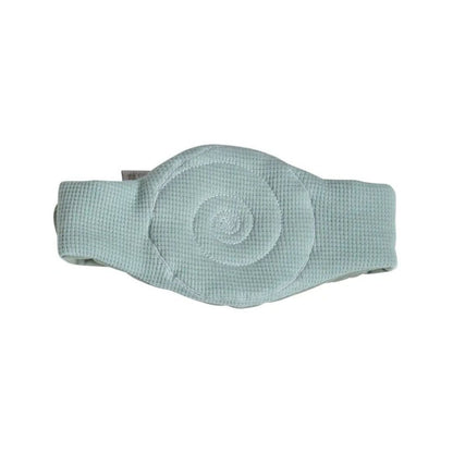 Sage green Candide mini massage heat pack for babies featuring a cherry stone pouch and adjustable Velcro straps.