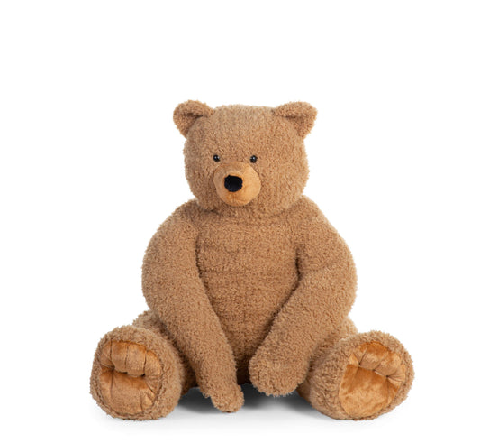 Oversized 76cm Childhome giant teddy bear in a sitting position, featuring soft brown fur and a friendly face.