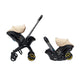 The Doona i 2-in-1 travel system in stroller mode with a faux-leather handlebar and adjustable headrest.