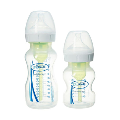 Dr. Brown’s Options+ wide-neck bottle sampler kit featuring bottles, sippy spout, removable handles, and travel caps.