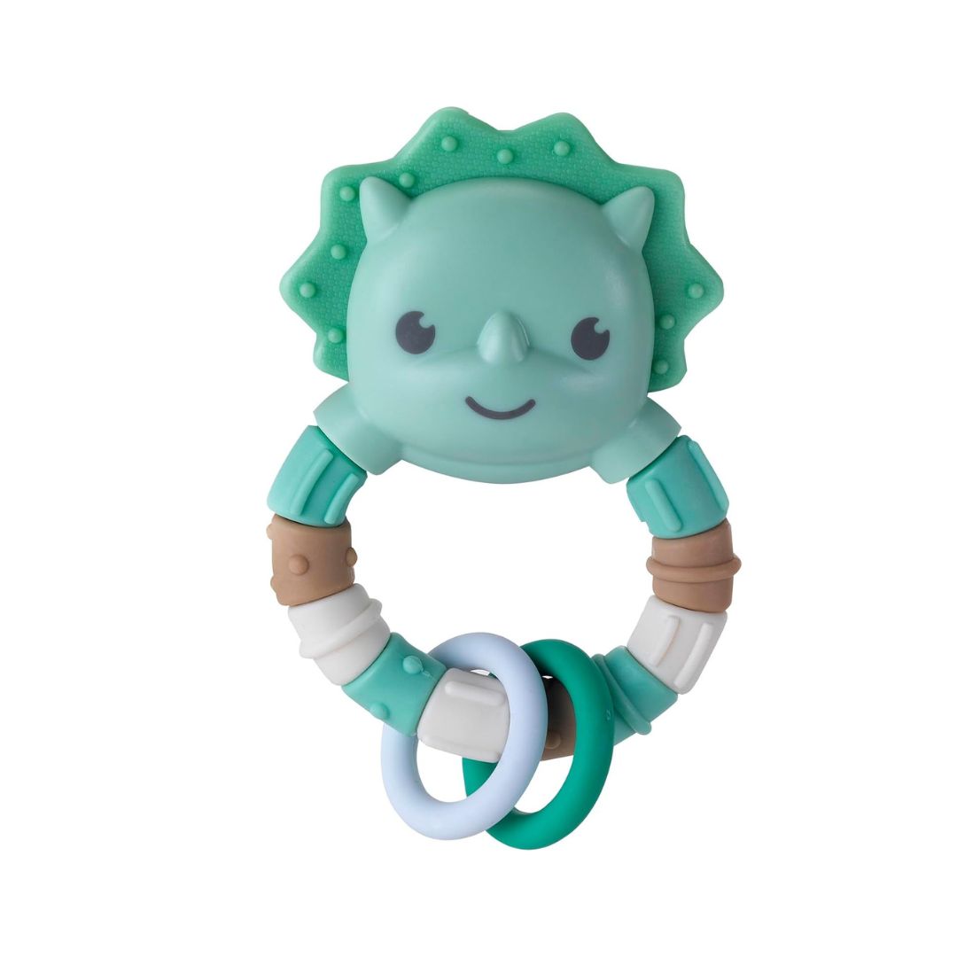 Colorful Infantino dinosaur teether with textured rings for baby teething relief.