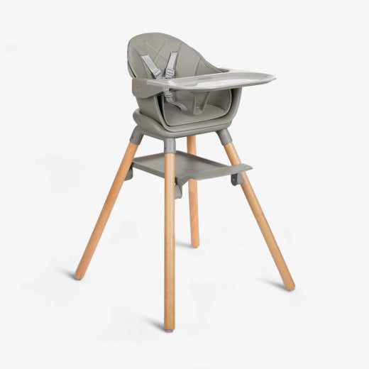 A modern Kikkaboo 2-in-1 wooden highchair with natural wood legs and a white seat, shown in both highchair and low toddler chair modes.