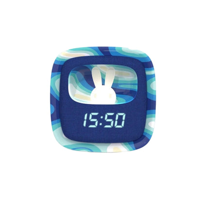 MOB Billy Clock and Night Light in Blue Waves, featuring a soft silicone rabbit light and digital alarm display for kids' bedrooms, available at BabyBuzz.