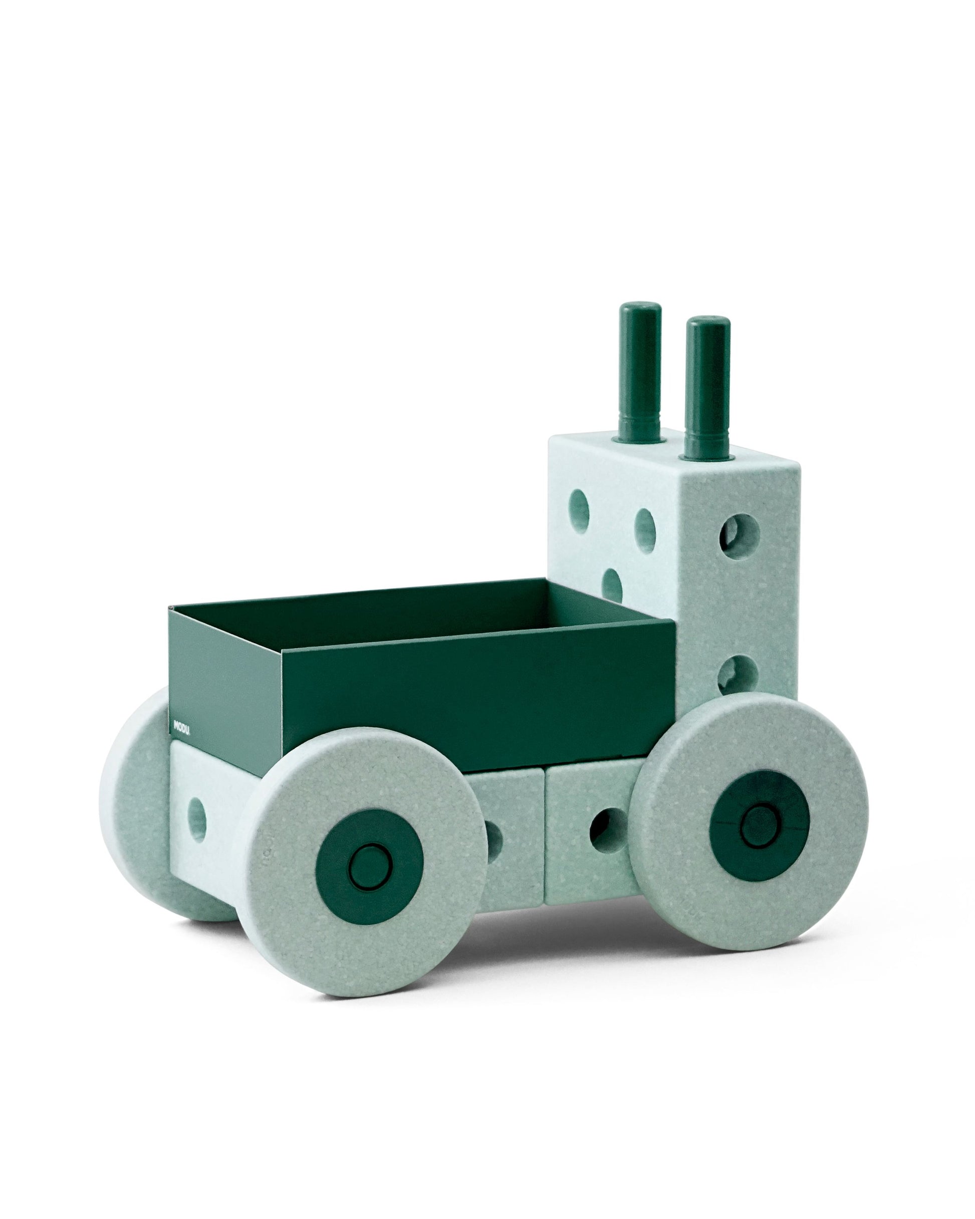 Children's toy truck with green body and gray wheels on a white background