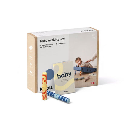 MODU Baby Activity Set in Deep Blue showing the base block, swirly wheels, and sensory rattle pegs.