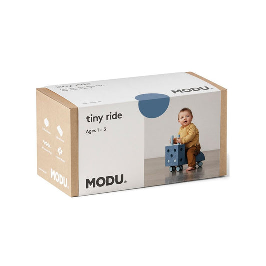 MODU toy packaging with a child and toy on a white background