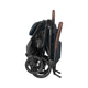 Maxi-Cosi Soho ultra-compact city stroller in Essential Graphite with a self-standing fold.