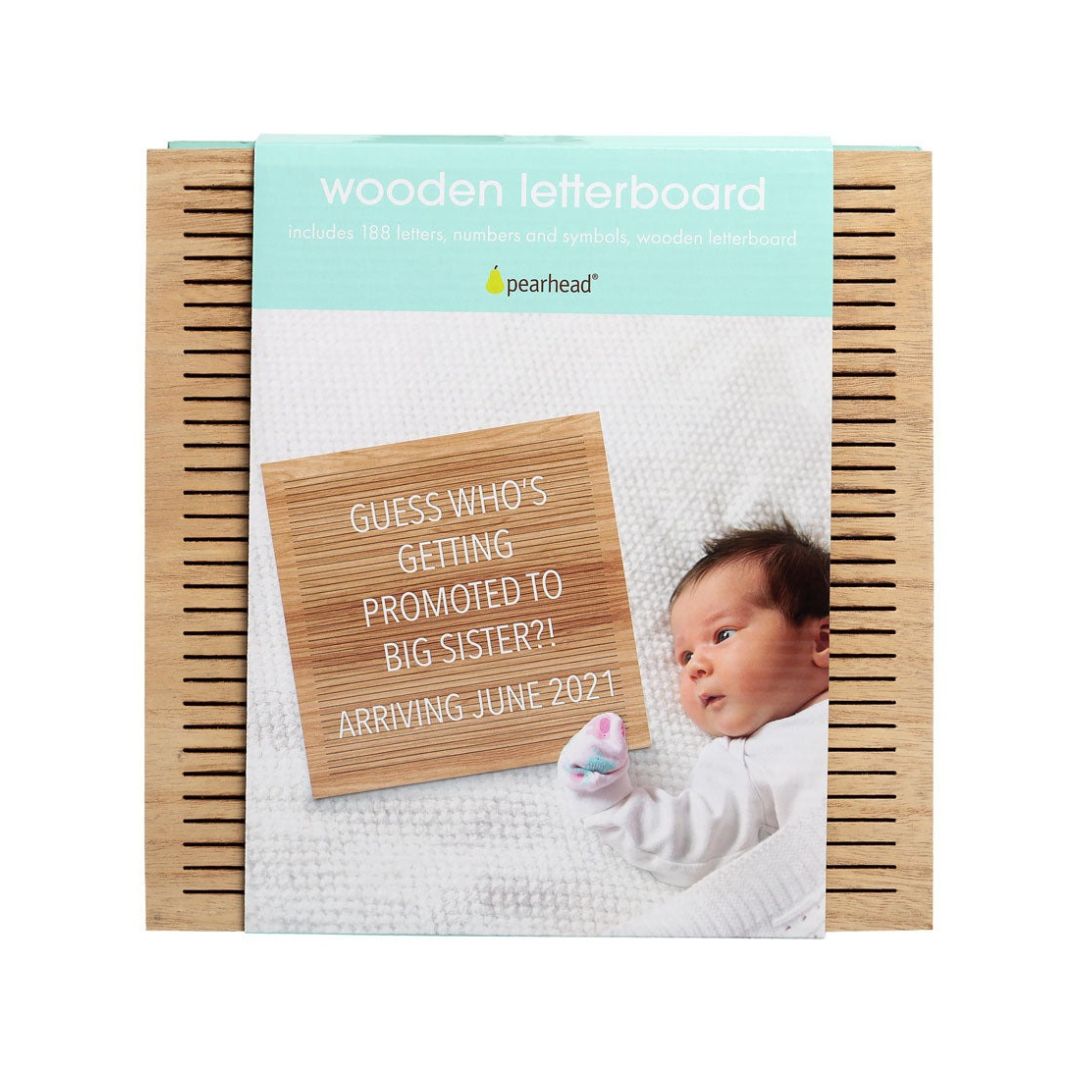 10x10 natural wooden letterboard by Pearhead with a set of white plastic letters for milestone photography.