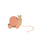 Pearhead wooden snail pull-along toy with a detachable shell filled with colorful rattling wooden balls.