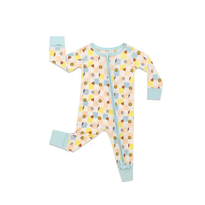 Baby onesie with colorful pattern on a white backgroundBabybuzzlebanon