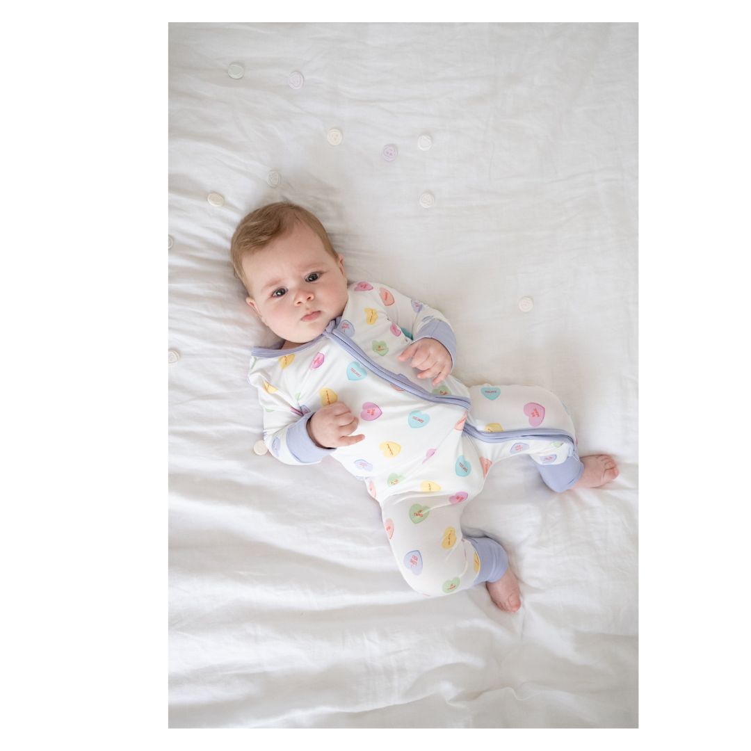 TeeJayz "Candy Heart" print bamboo zippy in 3-6 months with fold-over mittens.