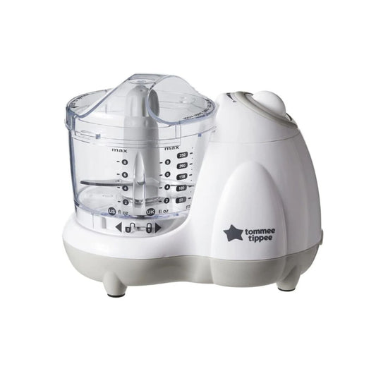 Compact Tommee Tippee baby food blender with a clear bowl and white base, ideal for making purees.