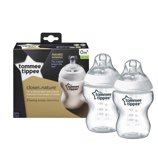 Two Tommee Tippee Closer to Nature feeding bottles with clear slow flow teats and ergonomic easy-hold design.