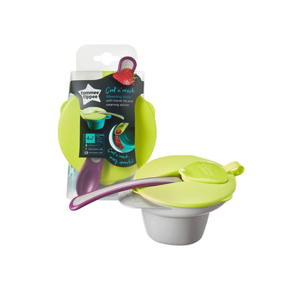 Tommee Tippee weaning bowl with a triangular base, pink and white design, featuring a mashing section and included soft tip spoon.