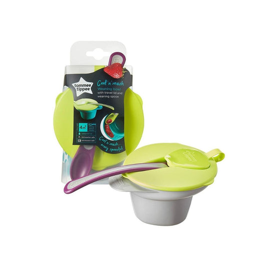 Tommee Tippee weaning bowl with a triangular base, pink and white design, featuring a mashing section and included soft tip spoon.