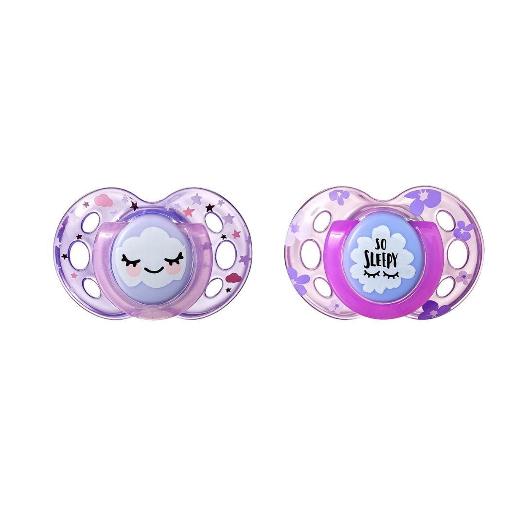 Two Tommee Tippee Night Time orthodontic soothers for toddlers 18-36 months in assorted understated designs.