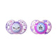 Two Tommee Tippee Night Time orthodontic soothers for toddlers 18-36 months in assorted understated designs.