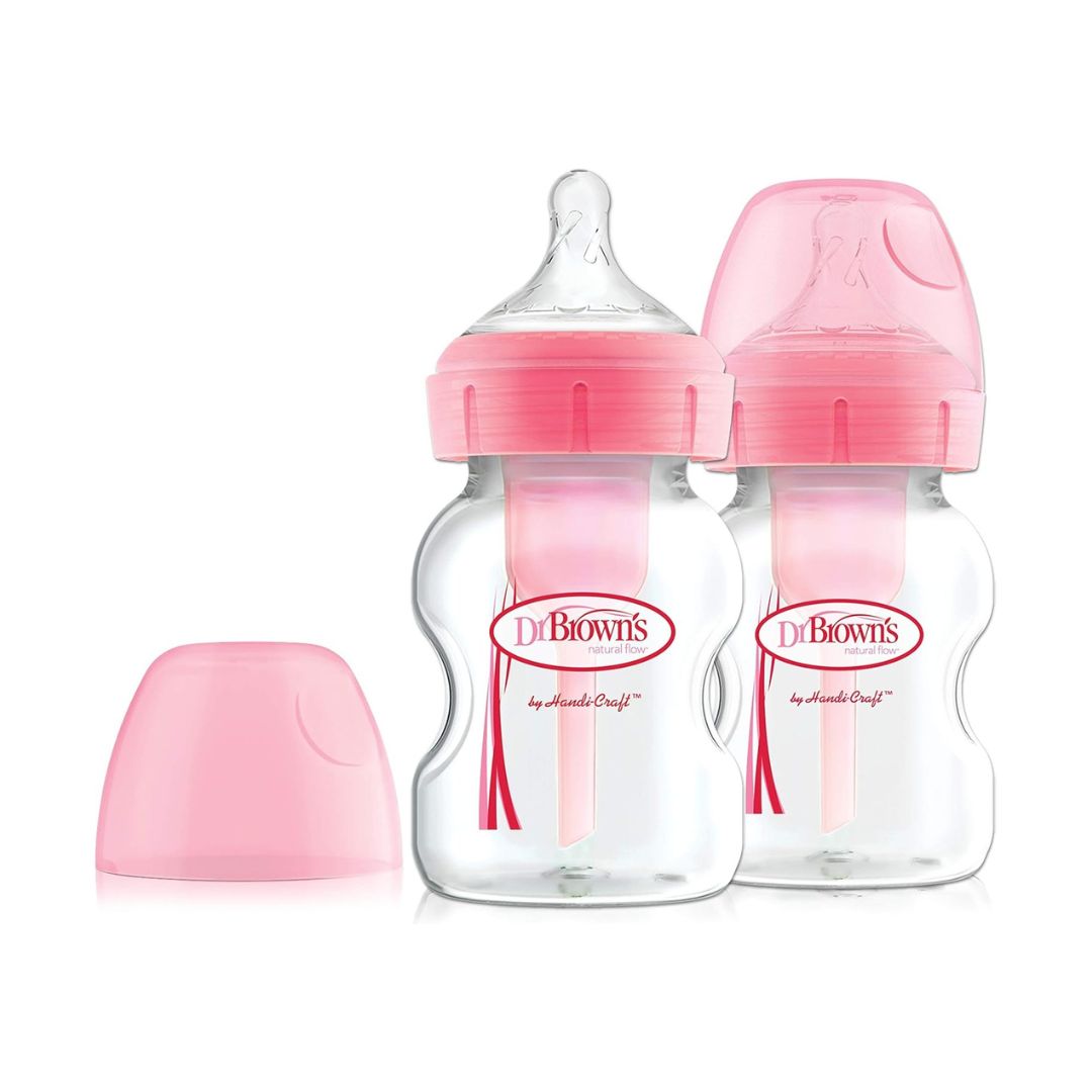 Two Dr. Brown's 150ml Options+ wide-neck baby bottles in pink with internal anti-colic vent systems.