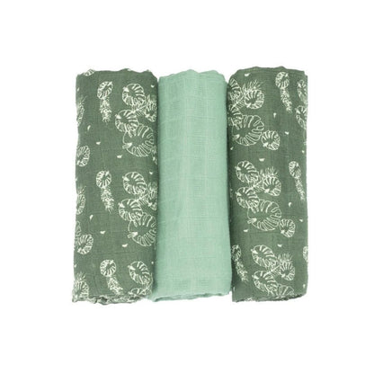 A set of three green and white leaf-patterned muslin swaddles for babies by Trois Kilos Sept, sized 70x70cm.