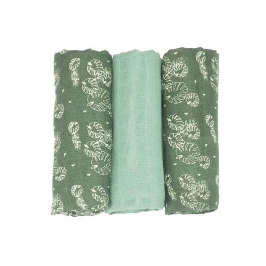 A set of three green and white leaf-patterned muslin swaddles for babies by Trois Kilos Sept, sized 70x70cm.